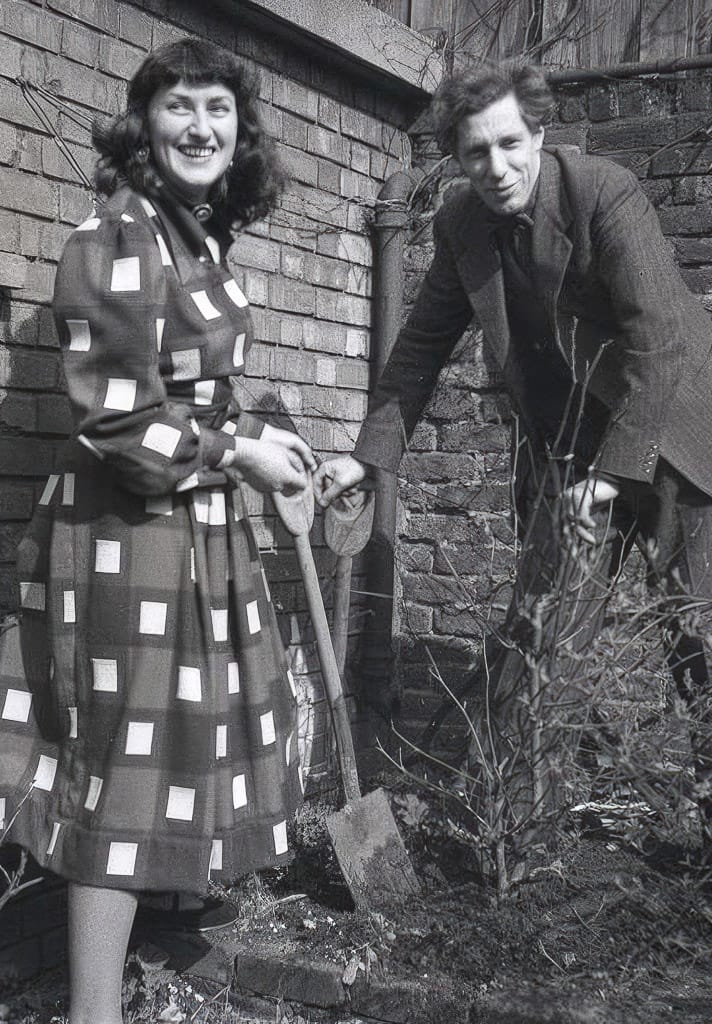 Mary Fedden gardening with Julian Trevelyan, exploring Midjourney prompt techniques for vibrant still lifes and color palettes.