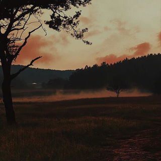 Pyramidroc style, Midjourney V6.1: realistic landscape photograph of quiet dawn