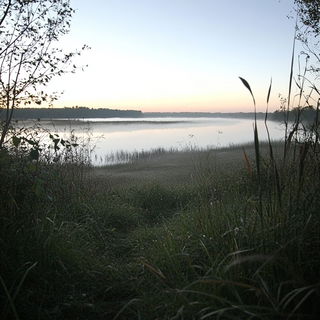 Kagebeam style, Midjourney V6.1: realistic landscape photograph of quiet dawn
