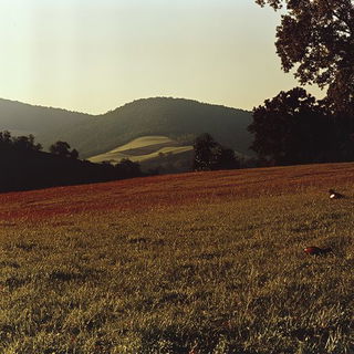 Paper Mirage style, Midjourney V6.1: realistic landscape photograph of quiet dawn