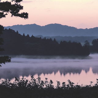 Cinemagma style, Midjourney V6.1: realistic landscape photograph of quiet dawn