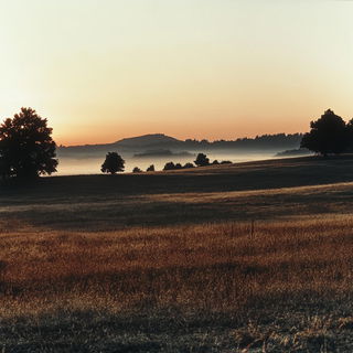 Sgraffito Mourning style, Midjourney V6.1: realistic landscape photograph of quiet dawn
