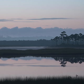 Harbour of Ash Reflections style, Midjourney V6.1: realistic landscape photograph of quiet dawn