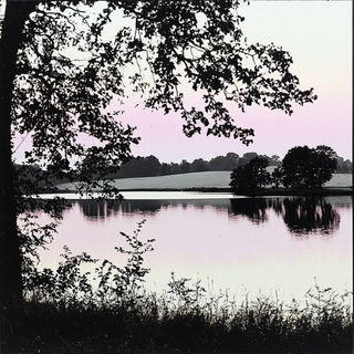 Gorgeglyph style, Midjourney V6.1: realistic landscape photograph of quiet dawn