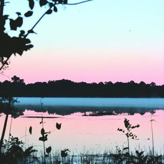 Riptide Chromageology style, Midjourney V6.1: realistic landscape photograph of quiet dawn