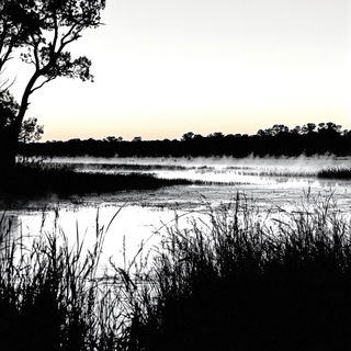 Monastarchitecture style, Midjourney V6.1: realistic landscape photograph of quiet dawn