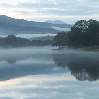 Mossframe Puppetworks style, Midjourney V6.1: realistic landscape photograph of quiet dawn