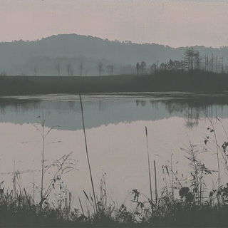 Gorewheel style, Midjourney V6.1: realistic landscape photograph of quiet dawn
