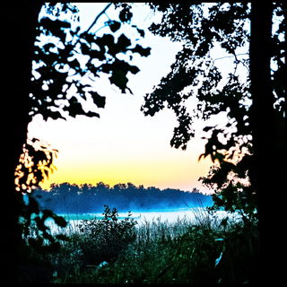 Pagodaflare style, Midjourney V6.1: realistic landscape photograph of quiet dawn