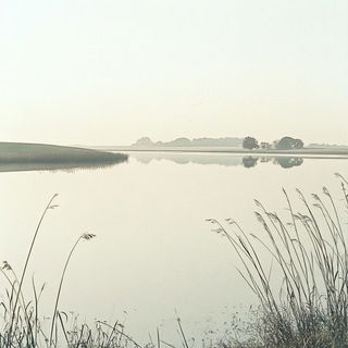 Flamemist style, Midjourney V6.1: realistic landscape photograph of quiet dawn