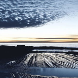 Whaleover Brick style, Midjourney V6.1: realistic landscape photograph of quiet dawn
