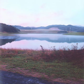 Chromatoga style, Midjourney V6.1: realistic landscape photograph of quiet dawn