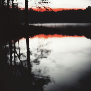 Lithic Ravage style, Midjourney V6.1: realistic landscape photograph of quiet dawn