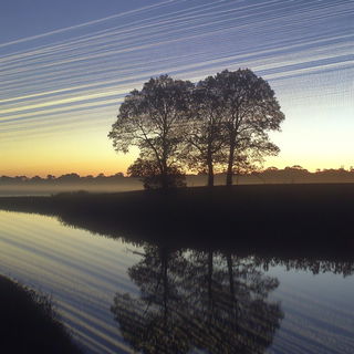 Astralgriffo style, Midjourney V6.1: realistic landscape photograph of quiet dawn