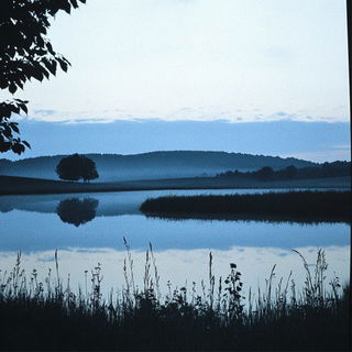 Chromapleinair style, Midjourney V6.1: realistic landscape photograph of quiet dawn