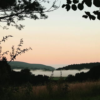 Inkamber style, Midjourney V6.1: realistic landscape photograph of quiet dawn