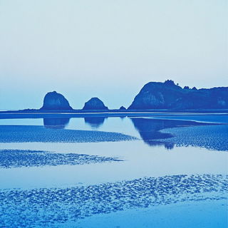 Vapourkin style, Midjourney V6.1: realistic landscape photograph of quiet dawn