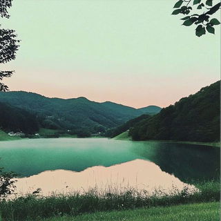 Castelluminism style, Midjourney V6.1: realistic landscape photograph of quiet dawn
