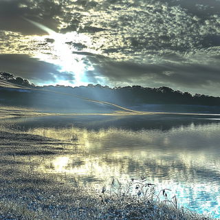 Pyroclastorama style, Midjourney V6.1: realistic landscape photograph of quiet dawn