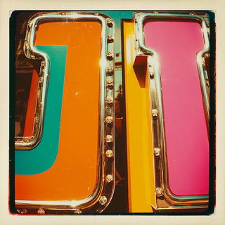Chromatic Scarf Joint style, Midjourney V7: typographic composition with large letters