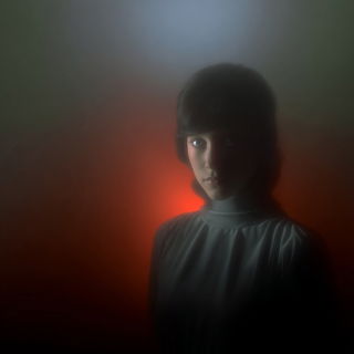 Aurumfog style, Midjourney V7: photographic portrait of female protagonist
