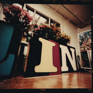Candidark style, Midjourney V7: typographic composition with large letters