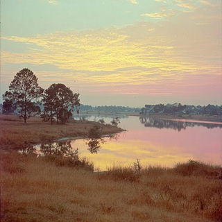 The Marigold Boulevard Studio style, Midjourney V7: realistic landscape photograph of quiet dawn