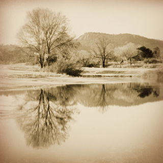 Caligo Antiqua style, Midjourney V7: realistic landscape photograph of quiet dawn