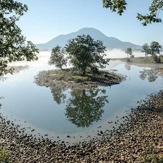Aureoclast style, Midjourney V7: realistic landscape photograph of quiet dawn