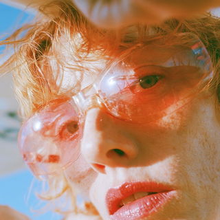 Freckleburn Chromaticism style, Midjourney V8.2: conceptual portrait photograph of Amelia Earhart