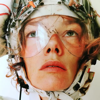 Balloonerie style, Midjourney V8.2: conceptual portrait photograph of Amelia Earhart